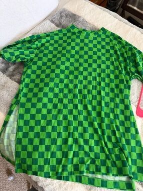 Dressed in LALA playsuit lucky green